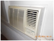 Photographie d’un climatiseur individuel monobloc vue de l’intérieur du local à climatiser